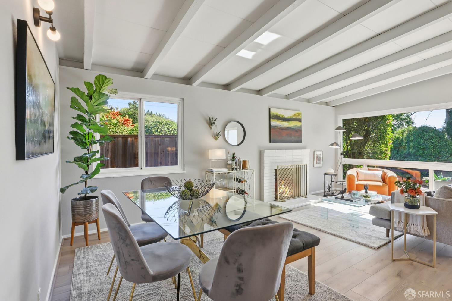 656 Pebble Drive El Sobrante, CA 94803 - Photo 24 of 41 a living room with fireplace furniture and a large window