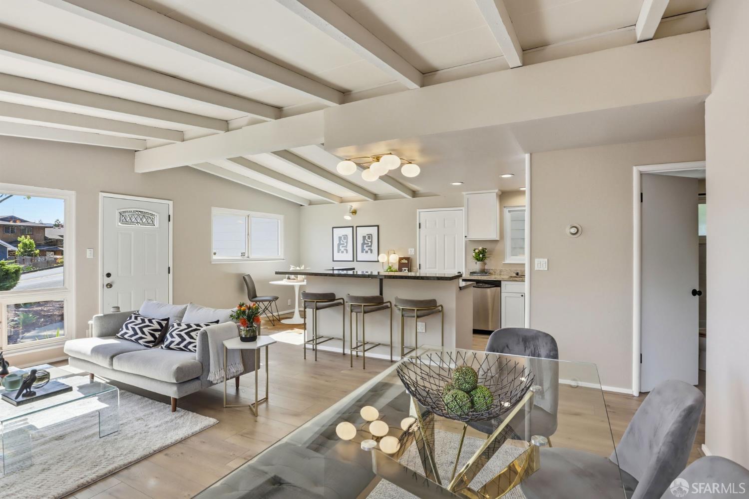 656 Pebble Drive El Sobrante, CA 94803 - Photo 25 of 41 a living room with lots of furniture and view of kitchen
