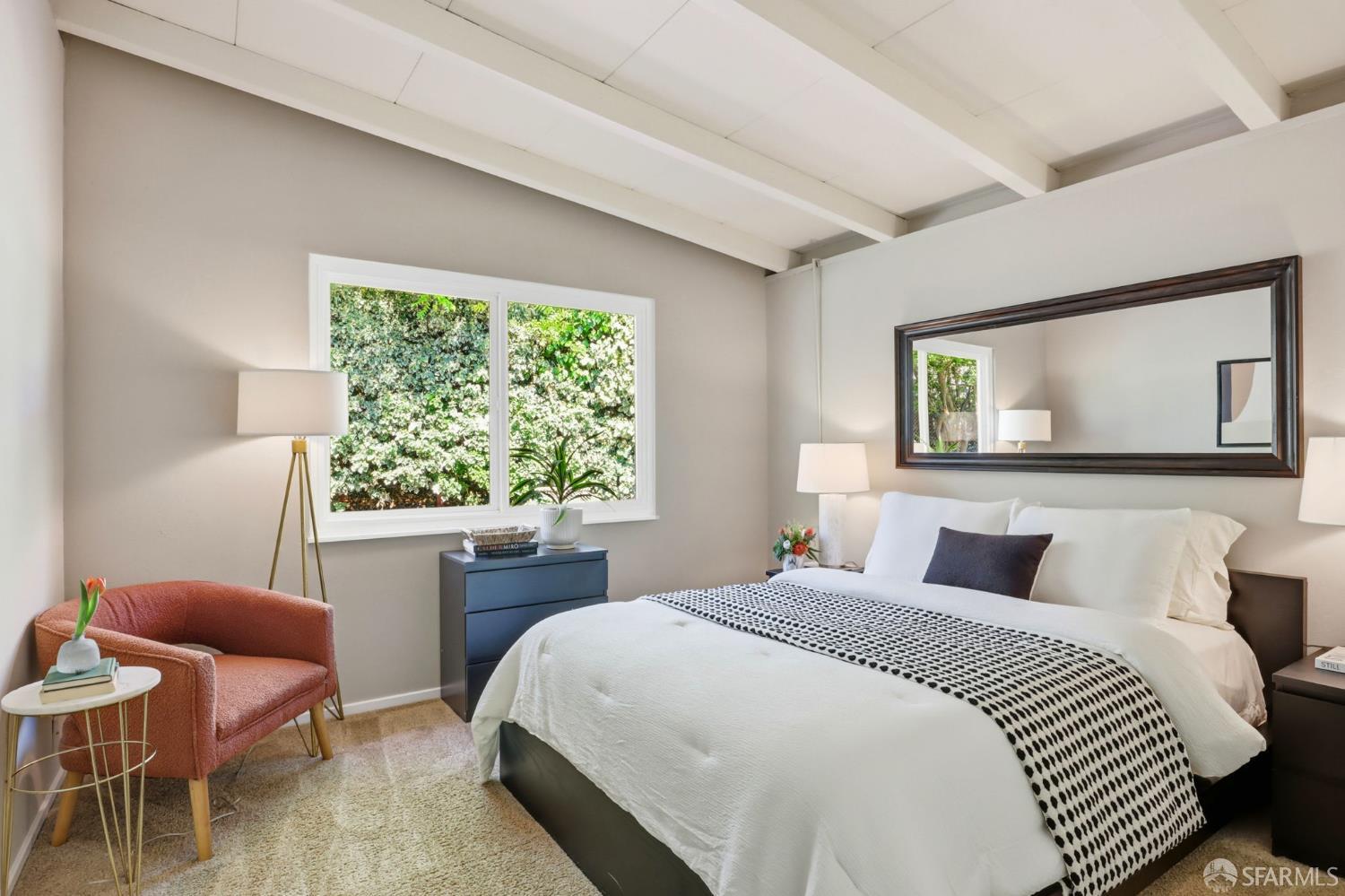 656 Pebble Drive El Sobrante, CA 94803 - Photo 31 of 41 a bedroom with a large bed and a large window