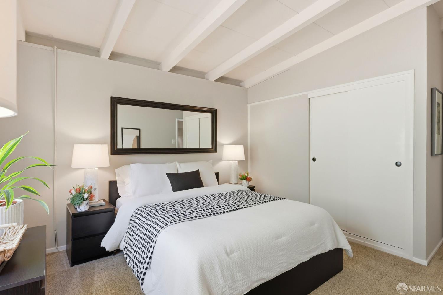 656 Pebble Drive El Sobrante, CA 94803 - Photo 32 of 41 a bedroom with a bed and a painting on the wall