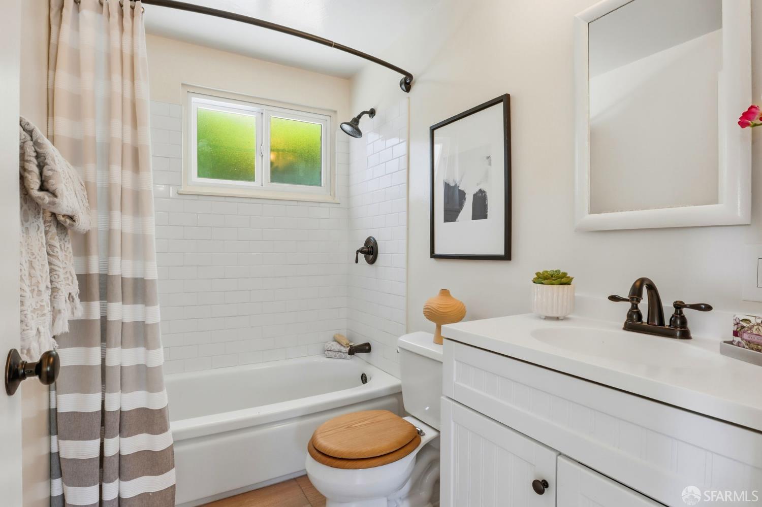 656 Pebble Drive El Sobrante, CA 94803 - Photo 33 of 41 a bathroom with a sink toilet and shower