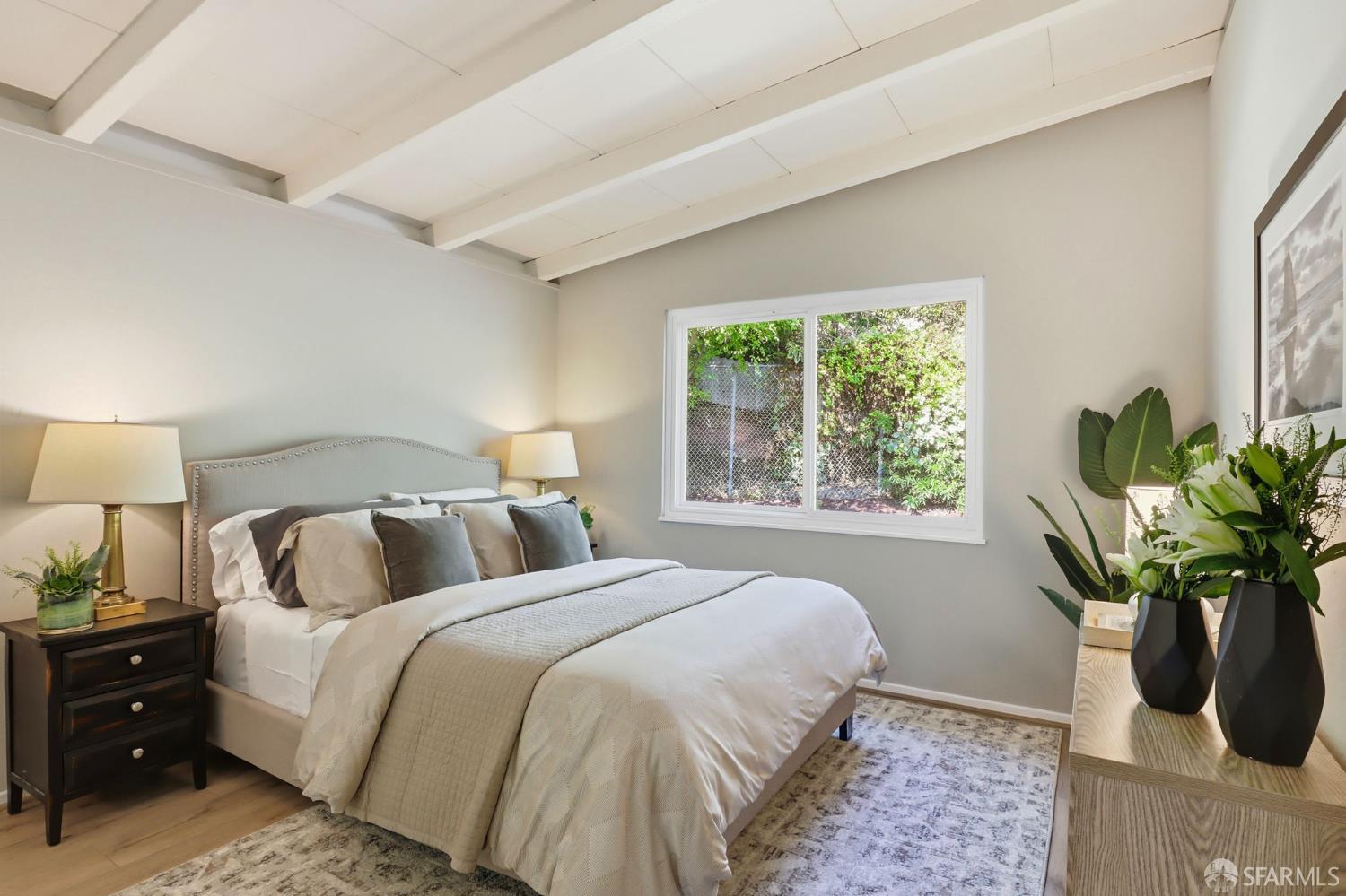 656 Pebble Drive El Sobrante, CA 94803 - Photo 6 of 41 a bedroom with bed and a potted plant