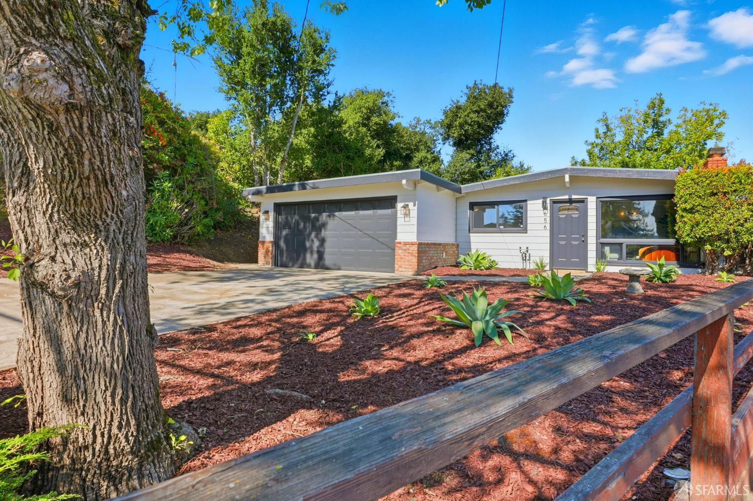 656 Pebble Drive El Sobrante, CA 94803 - Photo 10 of 41 a view of a house with backyard and sitting area