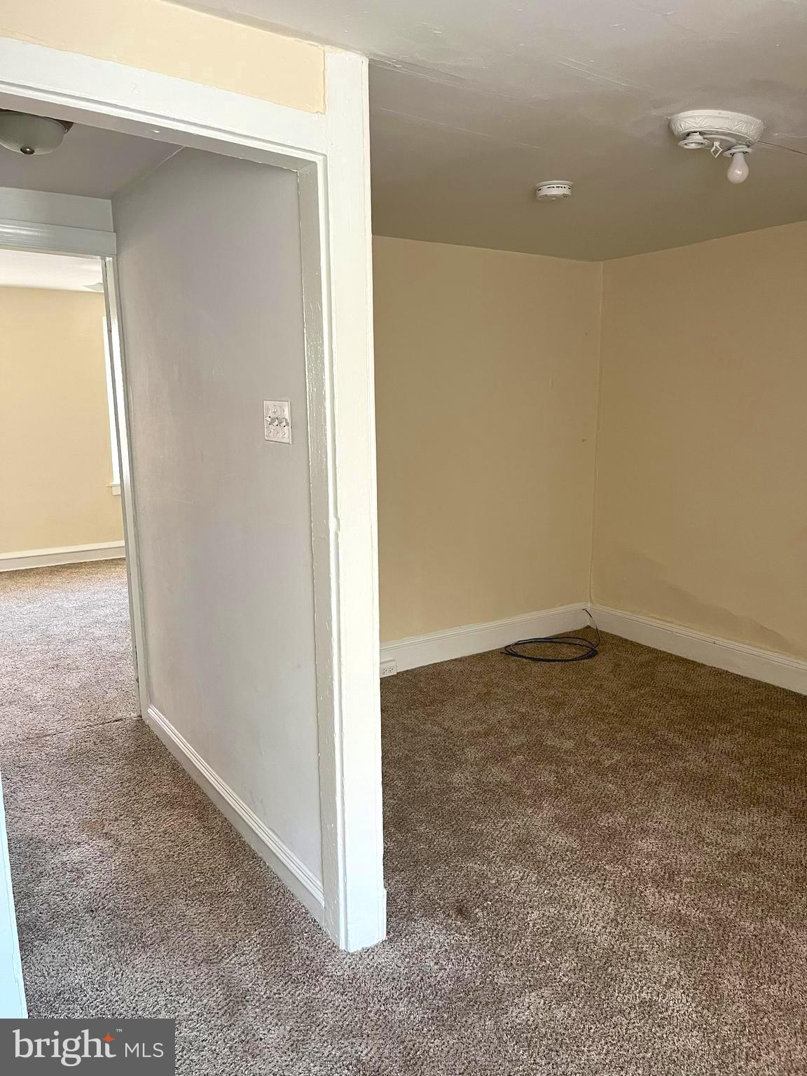 145 Levering Street Philadelphia, PA 19127 - Photo 9 of 13 an empty room with a door