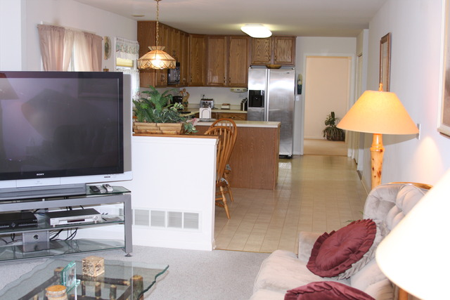 2826 Weld Road Elgin, IL 60124 - Photo 6 of 19 a kitchen with stainless steel appliances kitchen island granite countertop a refrigerator and a stove top oven