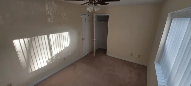 a view of empty room with a window