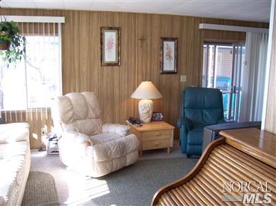 259 Ricardo Avenue, Unit 259 Santa Rosa, CA 95407 - Photo 3 of 12 a bedroom with bed and a window