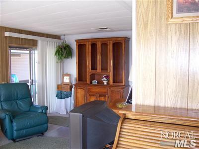 259 Ricardo Avenue, Unit 259 Santa Rosa, CA 95407 - Photo 4 of 12 a living room with furniture and a window