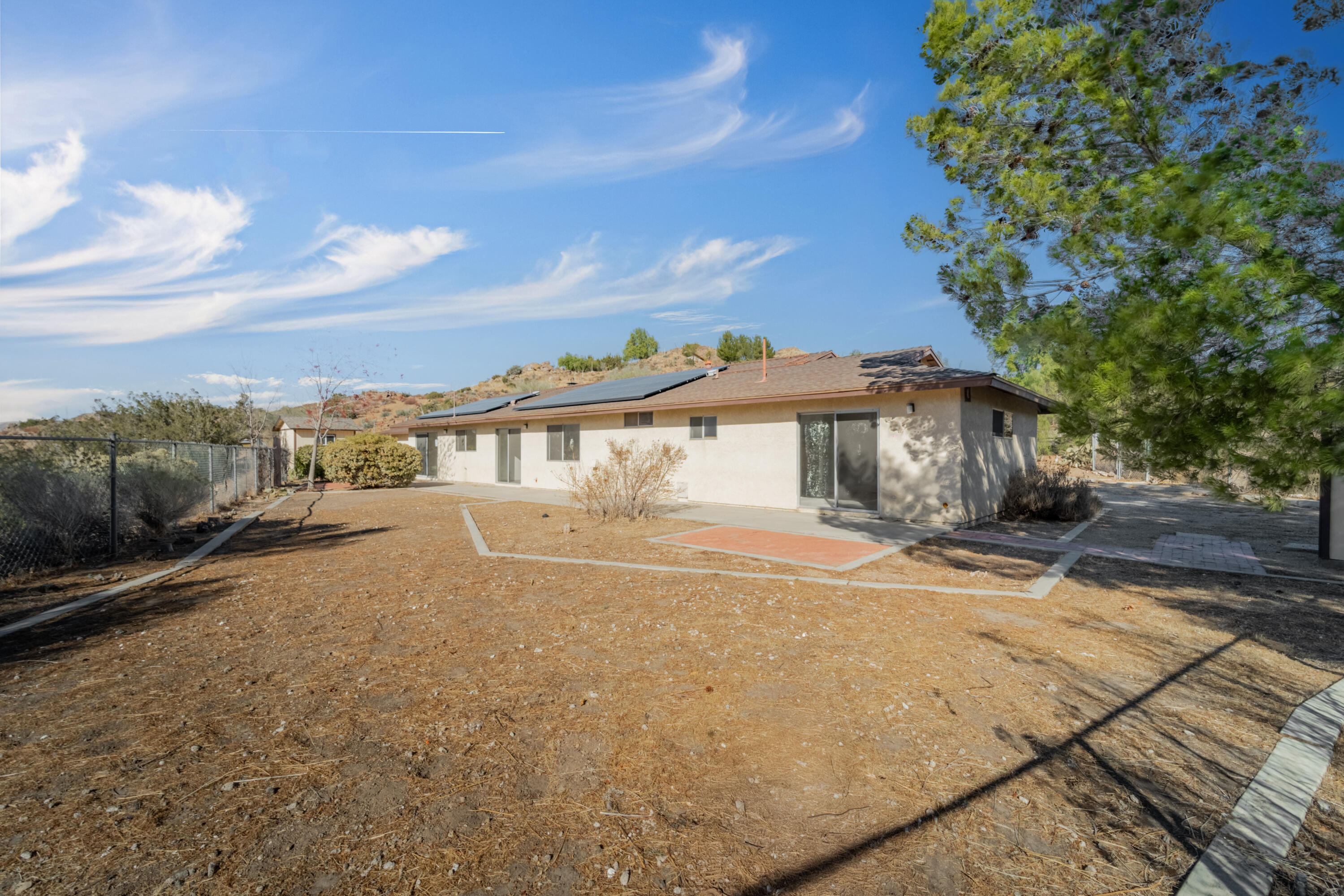 31427 Indian Oak Road Acton, CA 93510 - Photo 26 of 30 a front view of a house with a yard and balcony