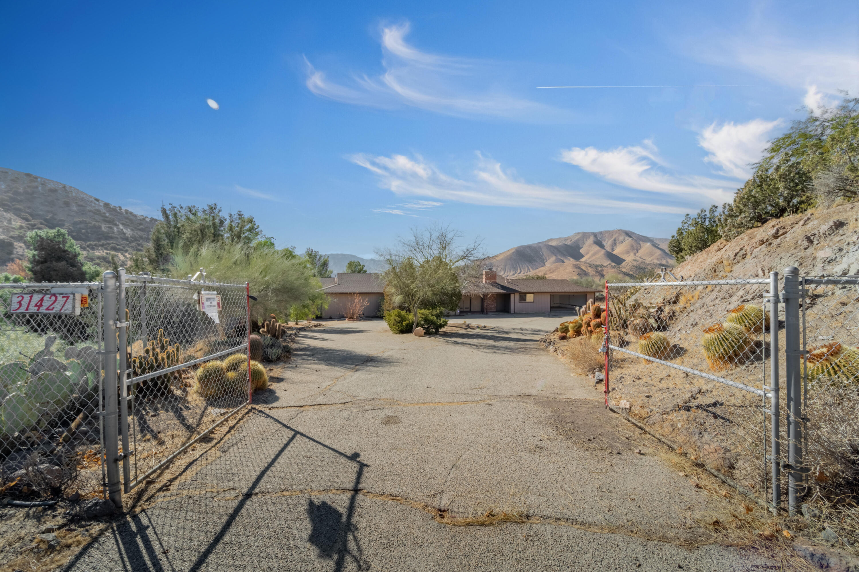 31427 Indian Oak Road Acton, CA 93510 - Photo 4 of 30 a view of a yard with horses