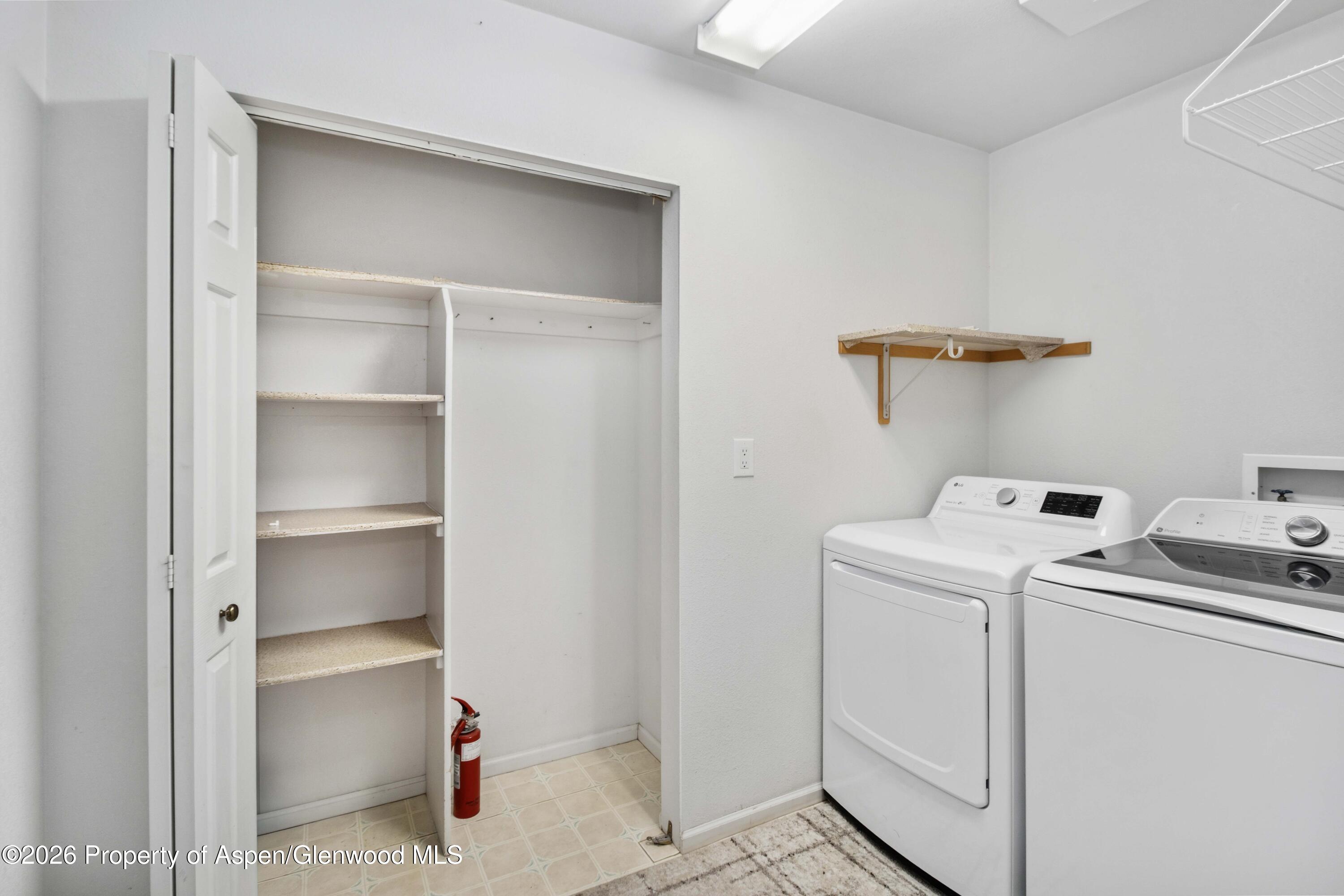 660 Aspen Avenue Rifle, CO 81650 - Photo 18 of 30 a utility room with dryer and washer