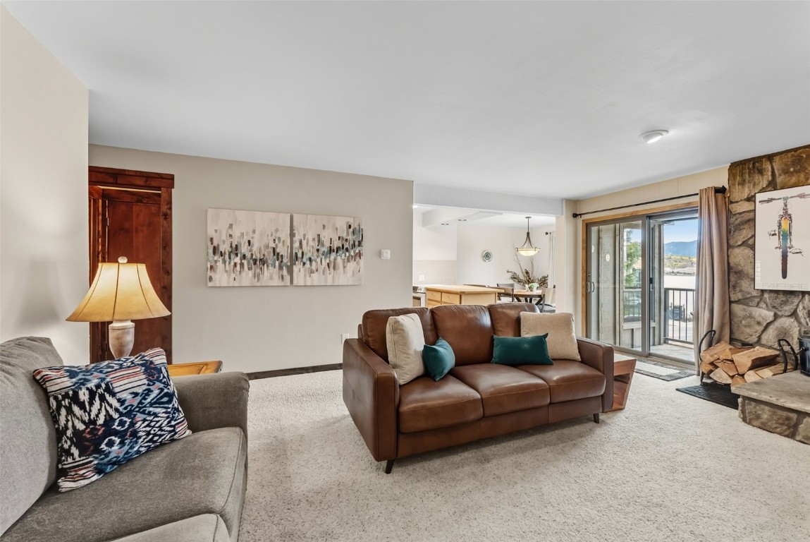 112 La Bonte Street, Unit 202 Dillon, CO 80435 - Photo 4 of 32 a living room with furniture and a large window