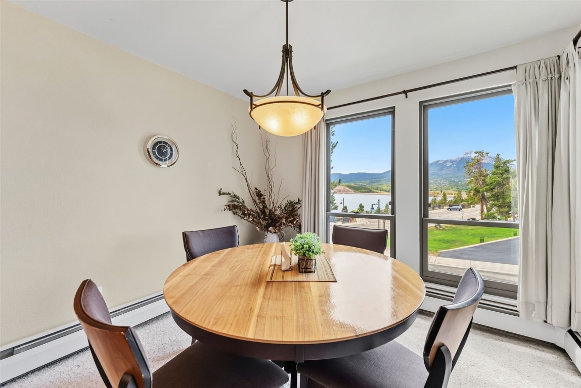 112 La Bonte Street, Unit 202 Dillon, CO 80435 - Photo 9 of 32 a dining room with furniture and window