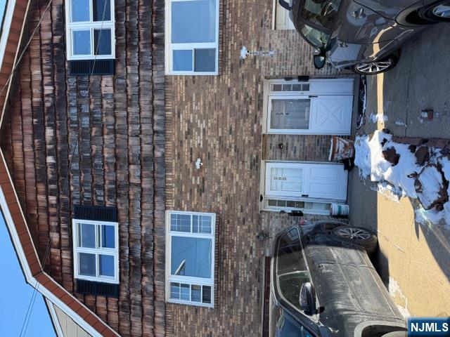 282-284 Washington Street, Unit 2 Fairview, NJ 07022 - Photo 1 of 6 a brick house with parking space