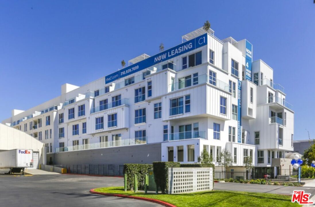 4210 Del Rey Avenue, Unit 401 Marina del Rey, CA 90292 - Photo 2 of 10 a front view of a building with street
