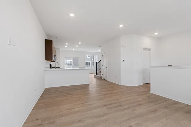 a view of kitchen with wooden floor