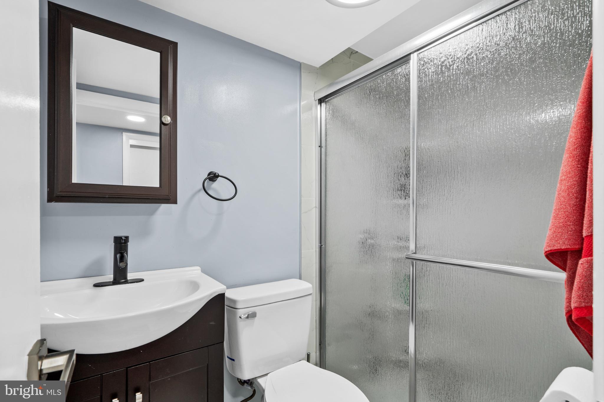 8912 Turton Drive Philadelphia, PA 19115 - Photo 17 of 34 Modern bathroom with sleek finishes.