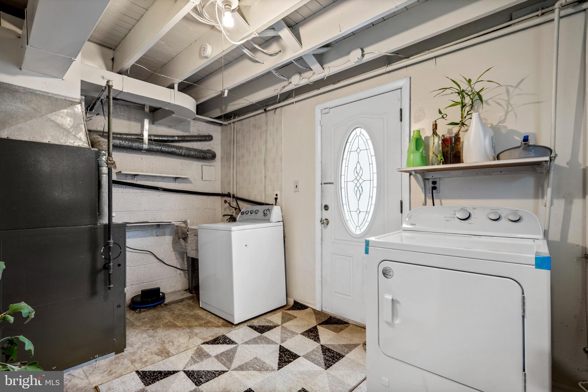 8912 Turton Drive Philadelphia, PA 19115 - Photo 5 of 34 Bright and functional laundry space.