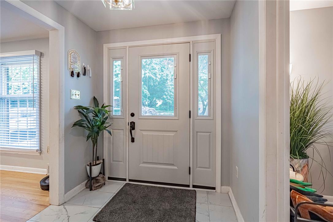 285 Bridle Path Road Bethlehem, PA 18017 - Photo 6 of 54 a view of entryway with wooden floor and front door