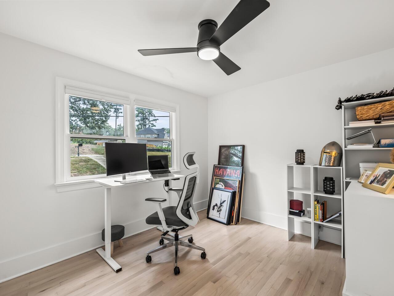 300 Dartmouth Road Raleigh, NC 27609 - Photo 14 of 28 a view of a workspace with furniture and a window