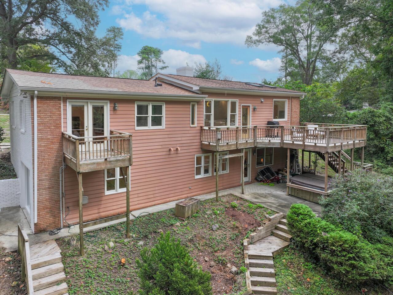 300 Dartmouth Road Raleigh, NC 27609 - Photo 26 of 28 a view of a house with a chairs in patio