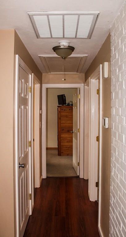 78 Michael Road Raynham, MA 02767 - Photo 15 of 42 a view of a hallway with wooden floor