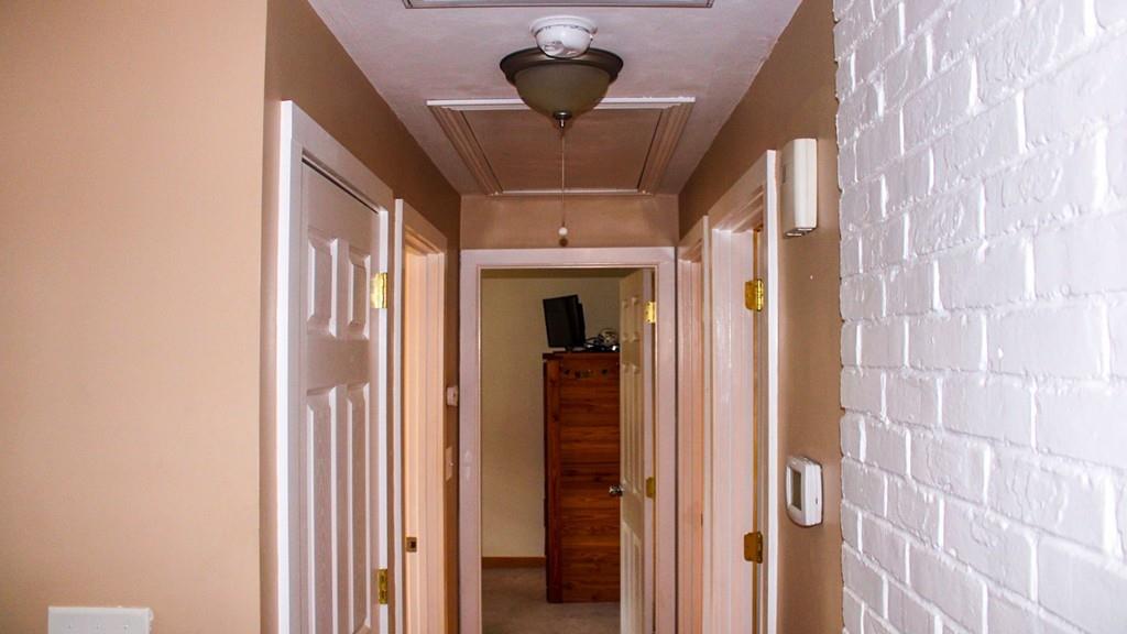 78 Michael Road Raynham, MA 02767 - Photo 16 of 42 a view of a hallway with wooden floor