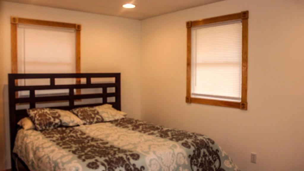 78 Michael Road Raynham, MA 02767 - Photo 19 of 42 a bed sitting in a bedroom next to a window