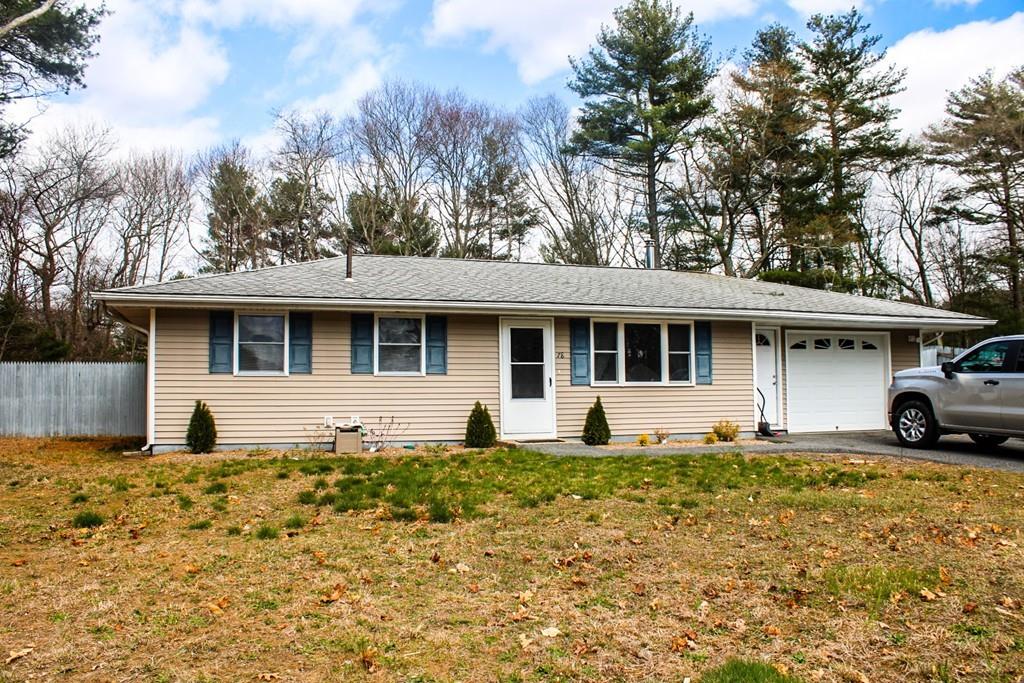 78 Michael Road Raynham, MA 02767 - Photo 2 of 42 a front view of a house with a yard