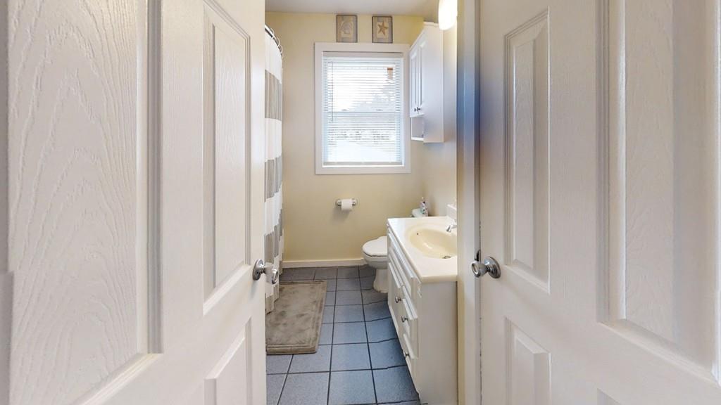 78 Michael Road Raynham, MA 02767 - Photo 21 of 42 a bathroom with a sink toilet and shower