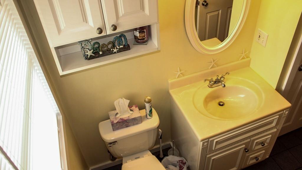 78 Michael Road Raynham, MA 02767 - Photo 25 of 42 a bathroom with a sink and a mirror