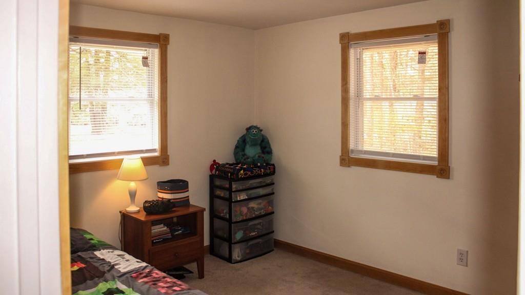 78 Michael Road Raynham, MA 02767 - Photo 26 of 42 a room with window and dresser