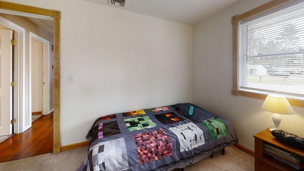 78 Michael Road Raynham, MA 02767 - Photo 27 of 42 a bedroom with a bed and a window