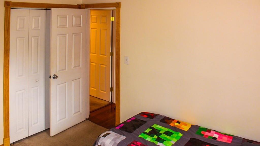 78 Michael Road Raynham, MA 02767 - Photo 29 of 42 a room with a bed and a window