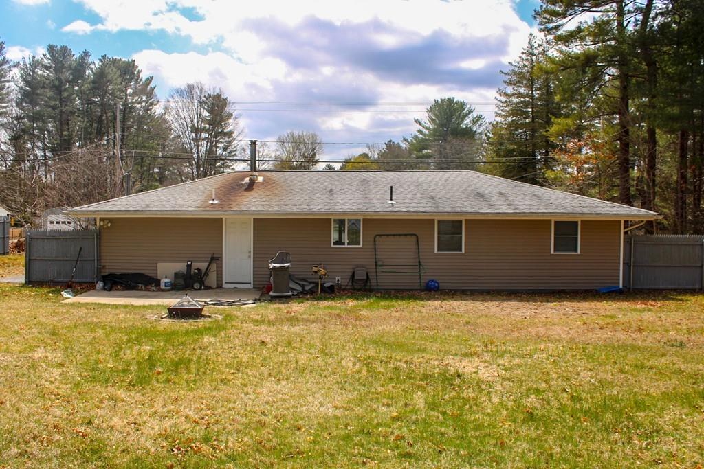 78 Michael Road Raynham, MA 02767 - Photo 39 of 42 a front view of a house with a yard