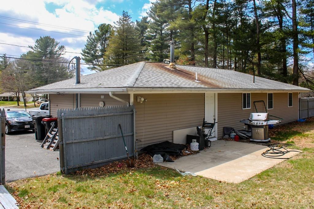 78 Michael Road Raynham, MA 02767 - Photo 40 of 42 a view of a house with a patio and sitting area