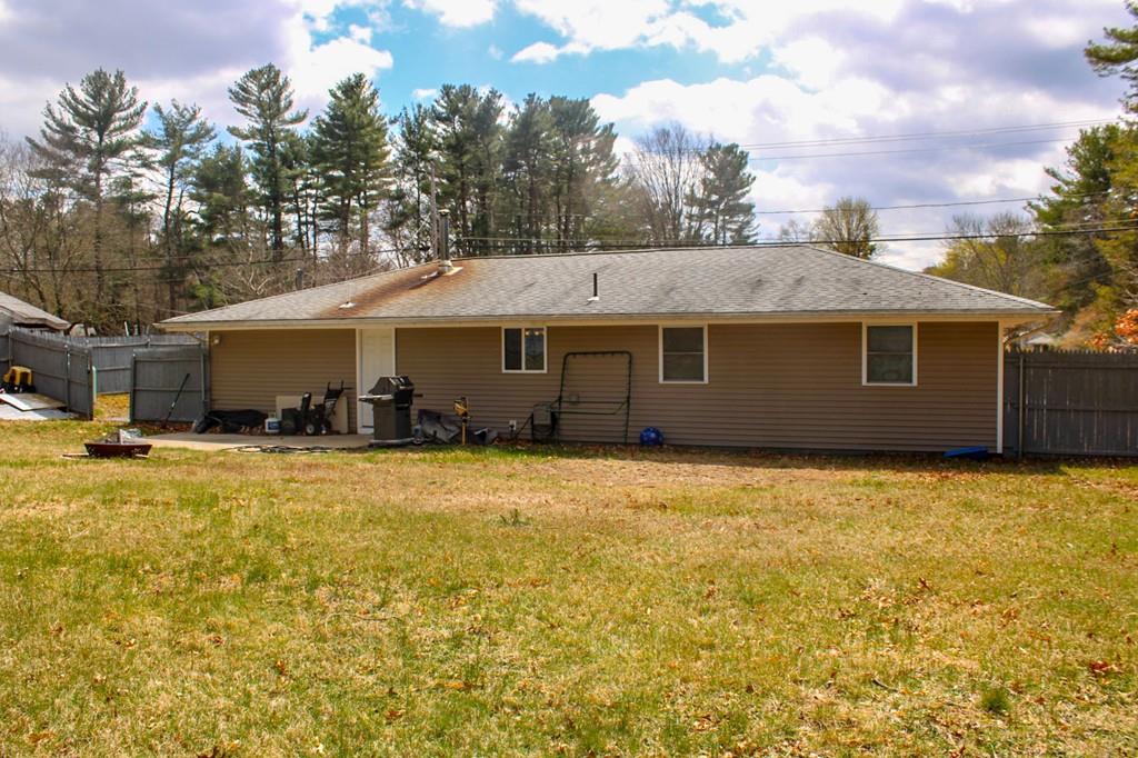 78 Michael Road Raynham, MA 02767 - Photo 41 of 42 a front view of a house with a garden