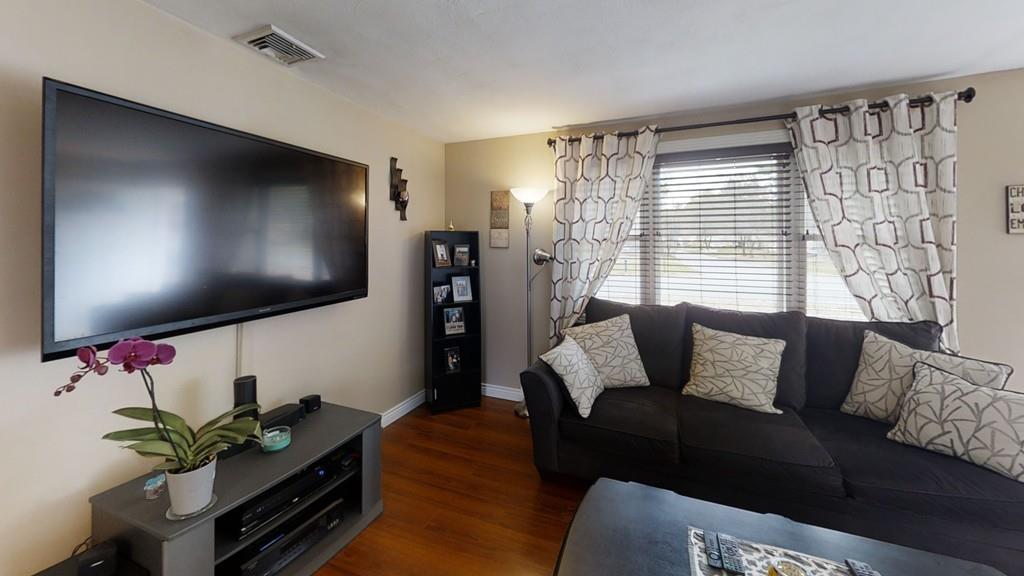 78 Michael Road Raynham, MA 02767 - Photo 6 of 42 a living room with furniture and a flat screen tv