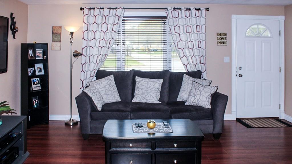 78 Michael Road Raynham, MA 02767 - Photo 8 of 42 a living room with furniture and wooden floor
