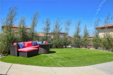 a garden view with a seating space