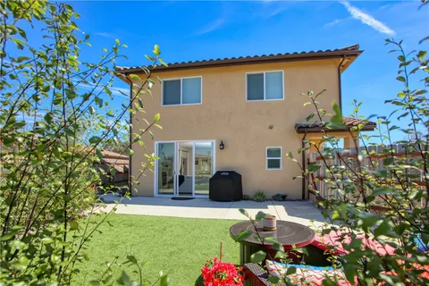a view of a balcony with wooden fence