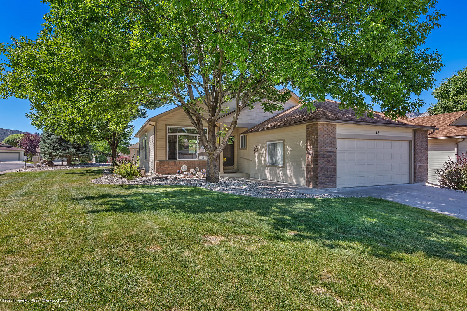 12 Poppy Court Parachute, CO 81635 - Photo 1 of 25 a front view of house with yard and green space