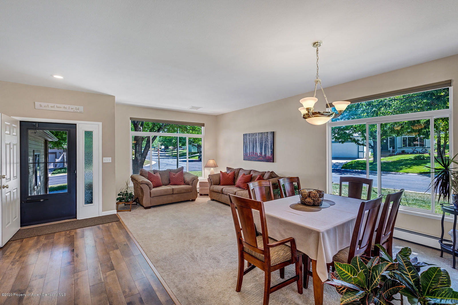 12 Poppy Court Parachute, CO 81635 - Photo 11 of 25 a view of a dining room with furniture window and wooden floor