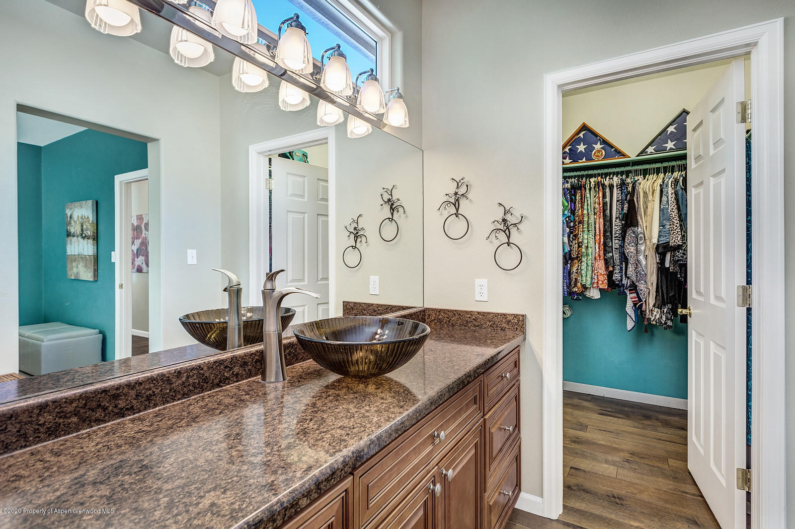 12 Poppy Court Parachute, CO 81635 - Photo 18 of 25 a living room with granite countertop furniture and a chandelier