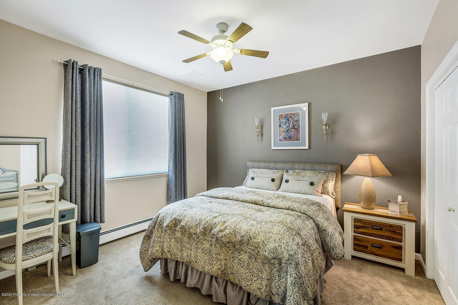 12 Poppy Court Parachute, CO 81635 - Photo 19 of 25 a bedroom with a bed and a cabinets
