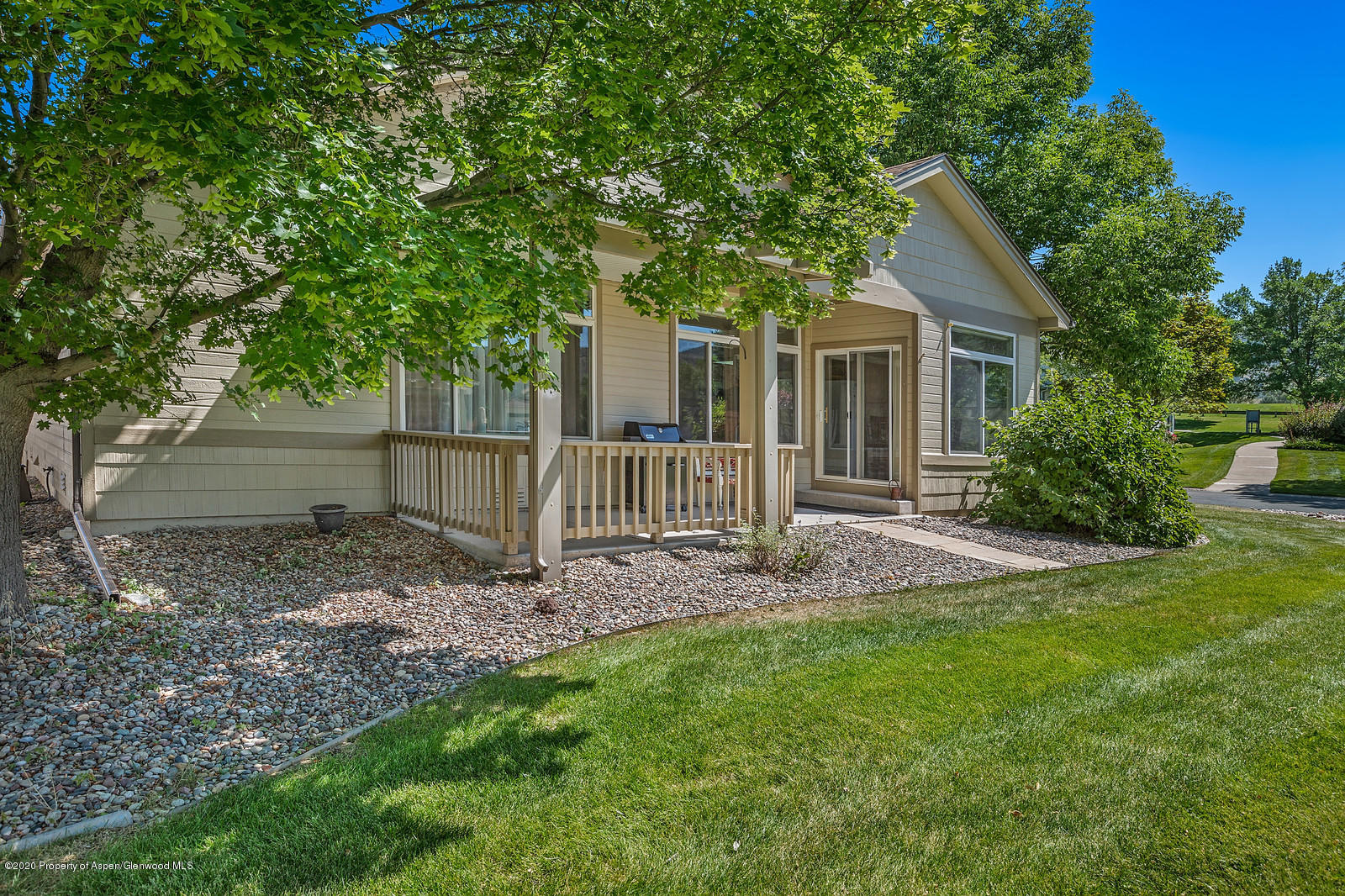 12 Poppy Court Parachute, CO 81635 - Photo 24 of 25 a view of a house with a yard and a garden
