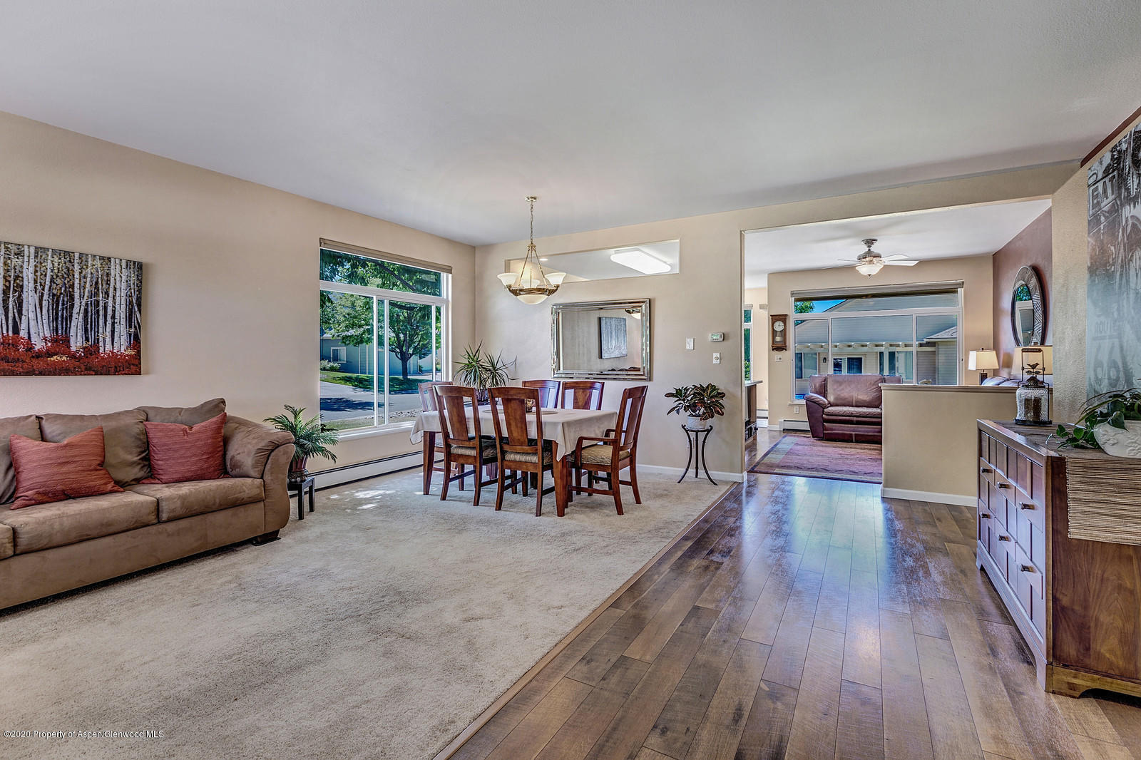 12 Poppy Court Parachute, CO 81635 - Photo 3 of 25 a living room with furniture and a wooden floor