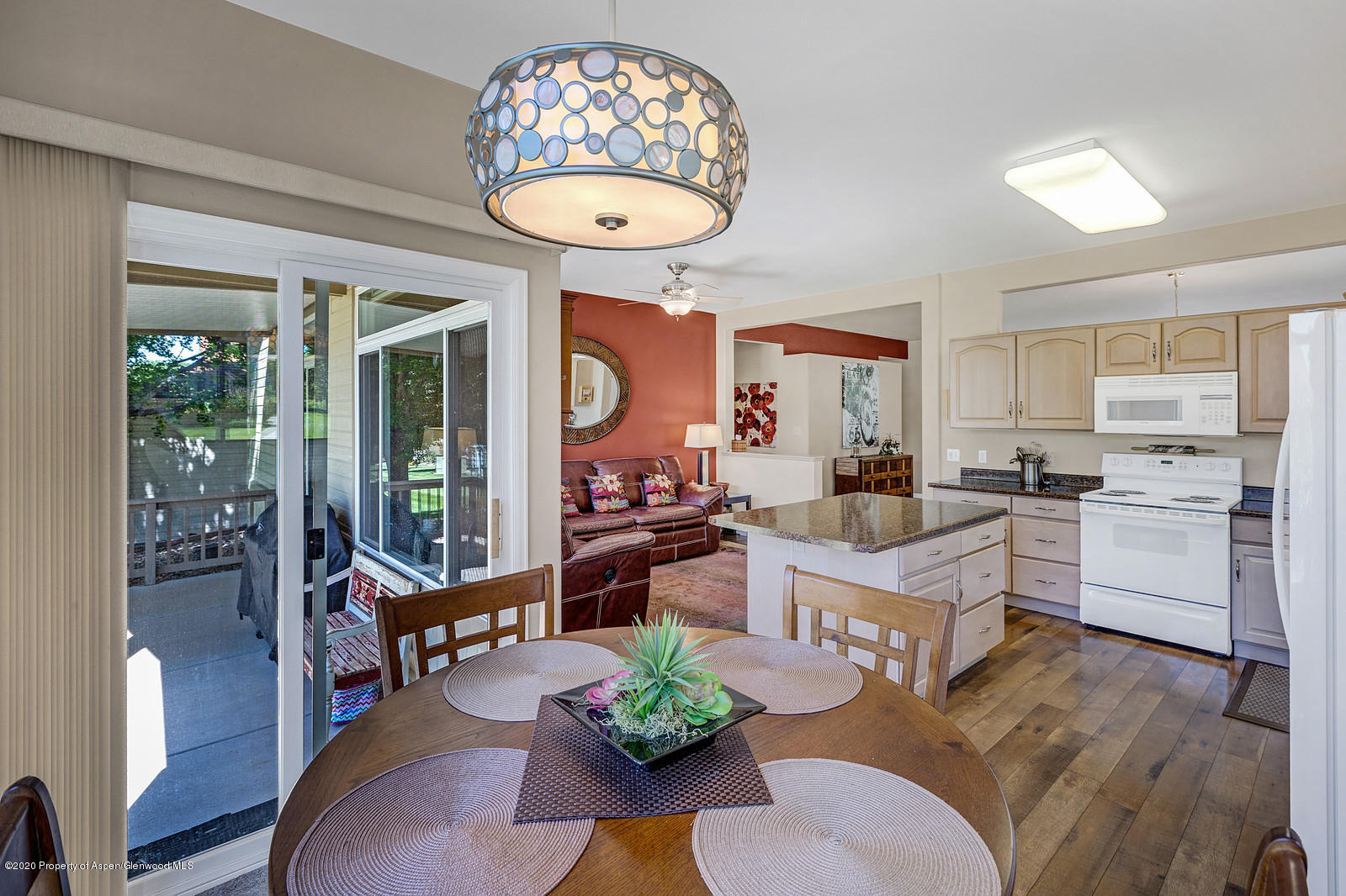 12 Poppy Court Parachute, CO 81635 - Photo 7 of 25 a living room with furniture chandelier and a table