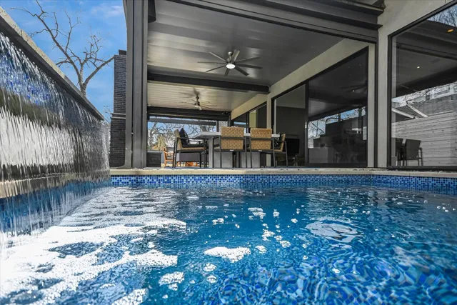 a front view of a house with a fence