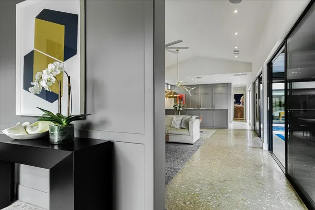 a kitchen with a table and chairs in it